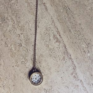 Gold tone necklace with 1" disc pendant